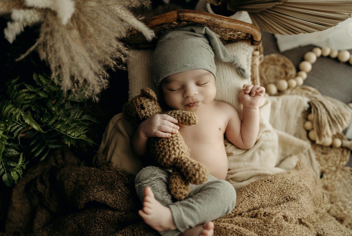 newborn photoshoot with heirloom props