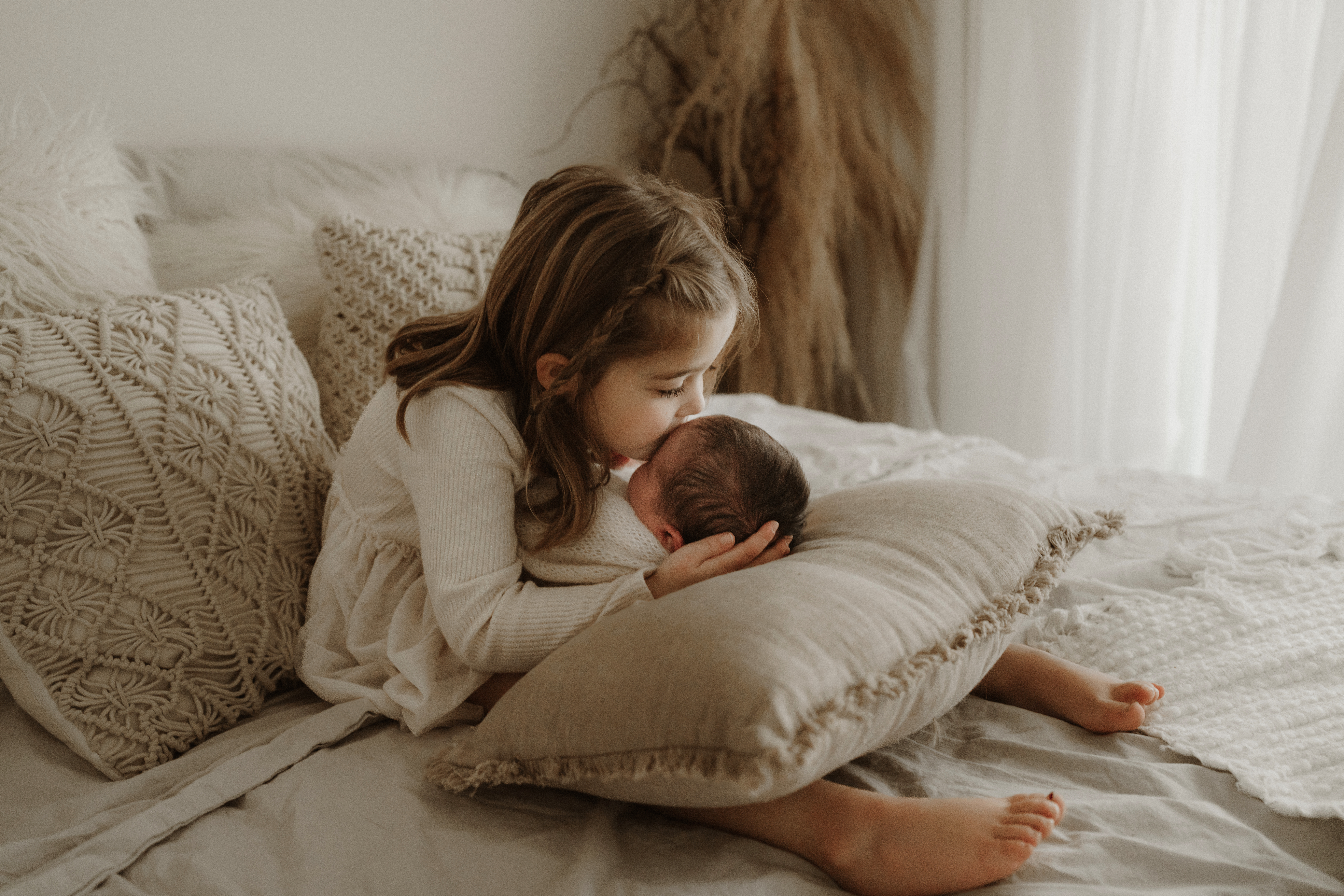 newborn baby boy with sister sibling in Jen Jacobowitz Photography boho studio in Richmond VA