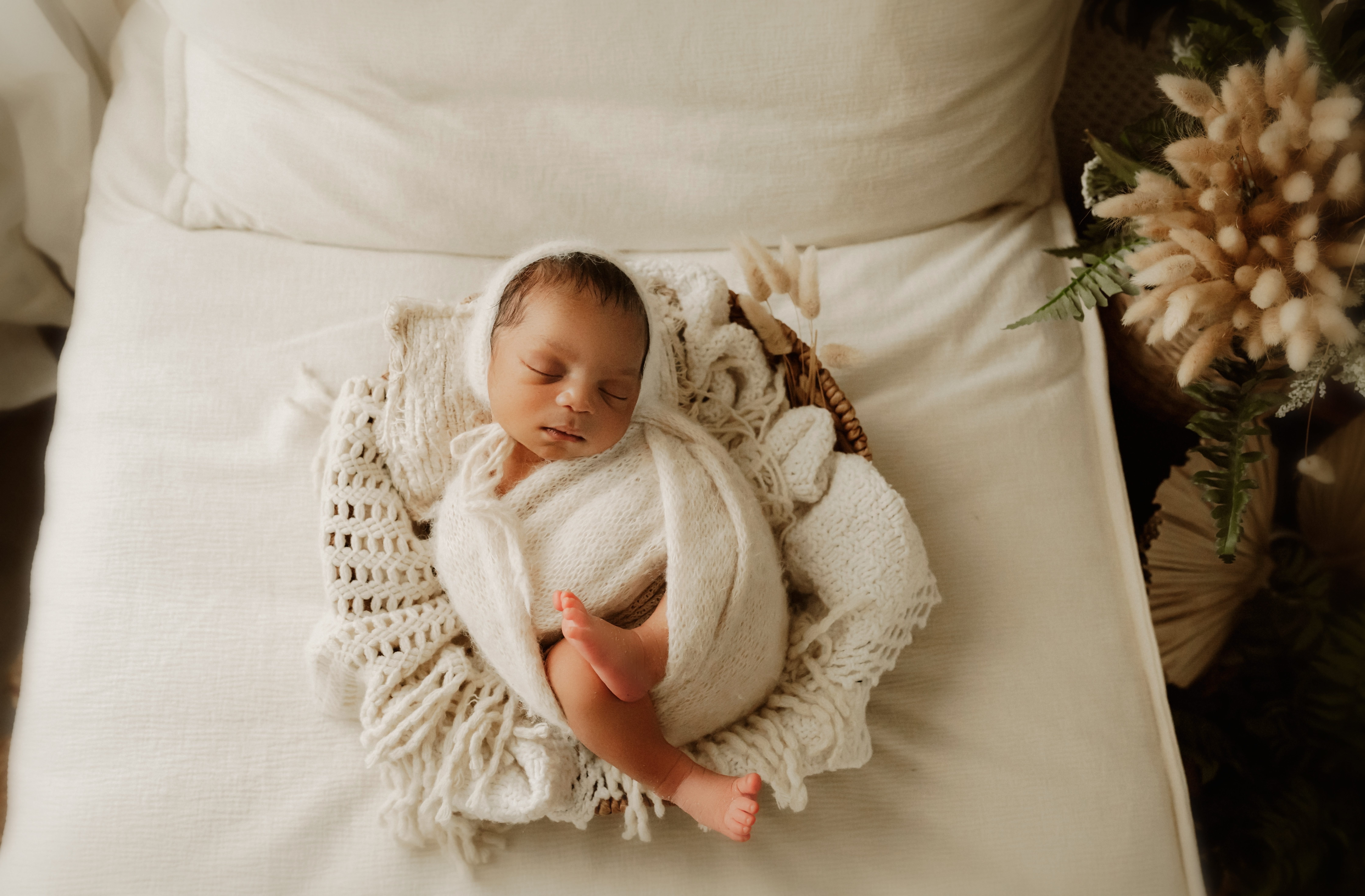 lifestyle newborn photography in Jen Jacobowtiz's boho photography studio in Richmond VA