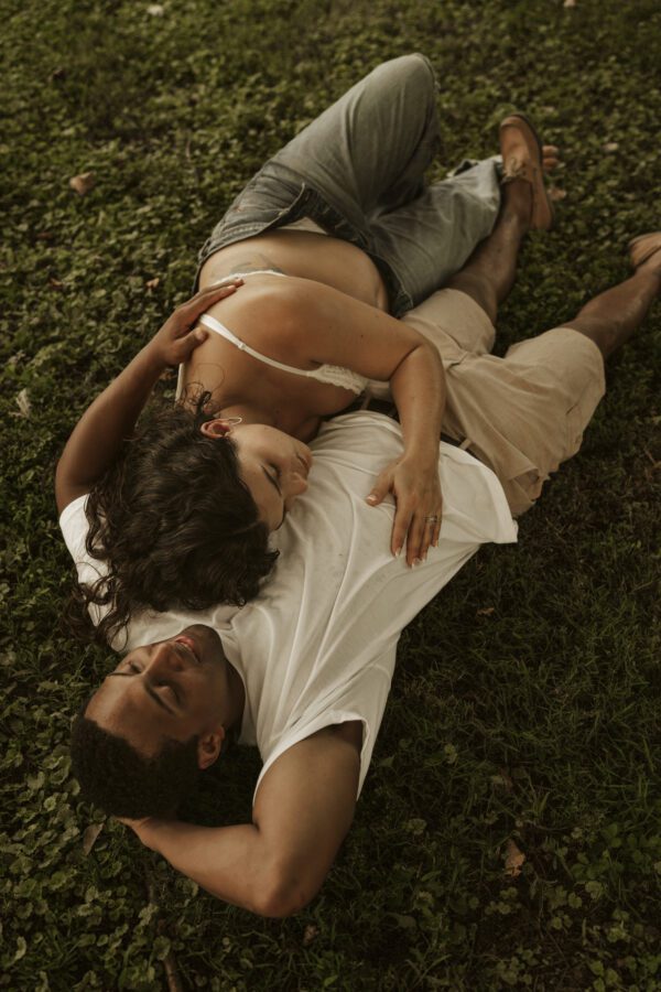 Outdoor maternity photography in Richmond VA with vintage tones and golden hour lighting