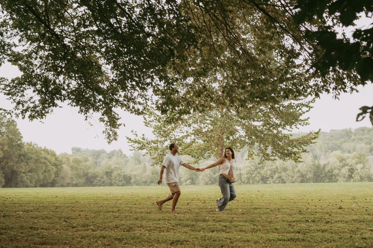Outdoor maternity photography in Richmond VA with vintage tones and golden hour lighting